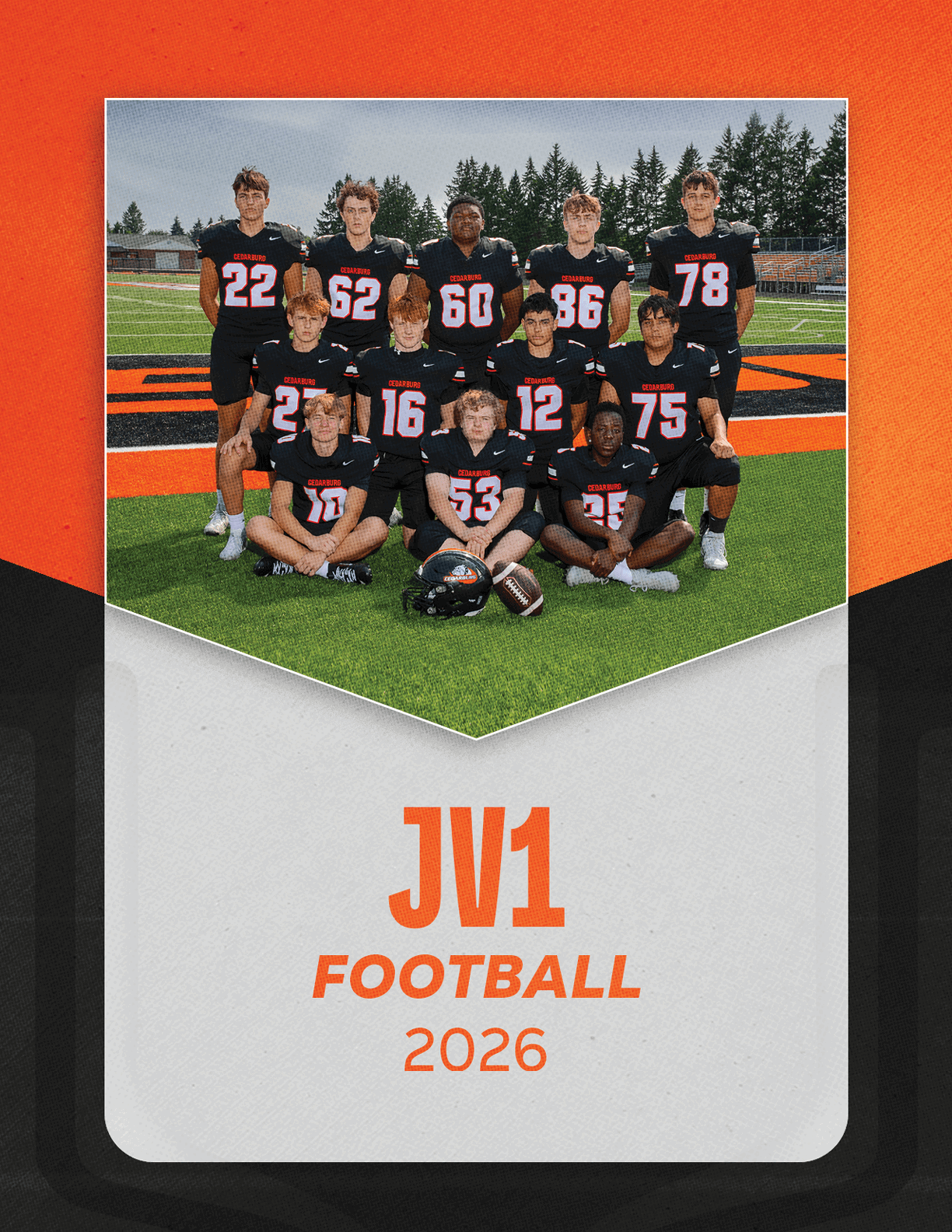 A group of football players sitting on a bench. Description generated by AI