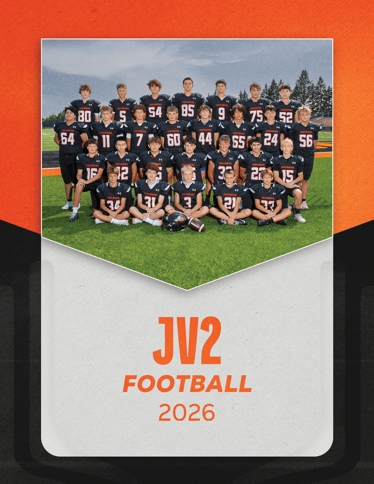 A group of football players sitting on a bench. Description generated by AI