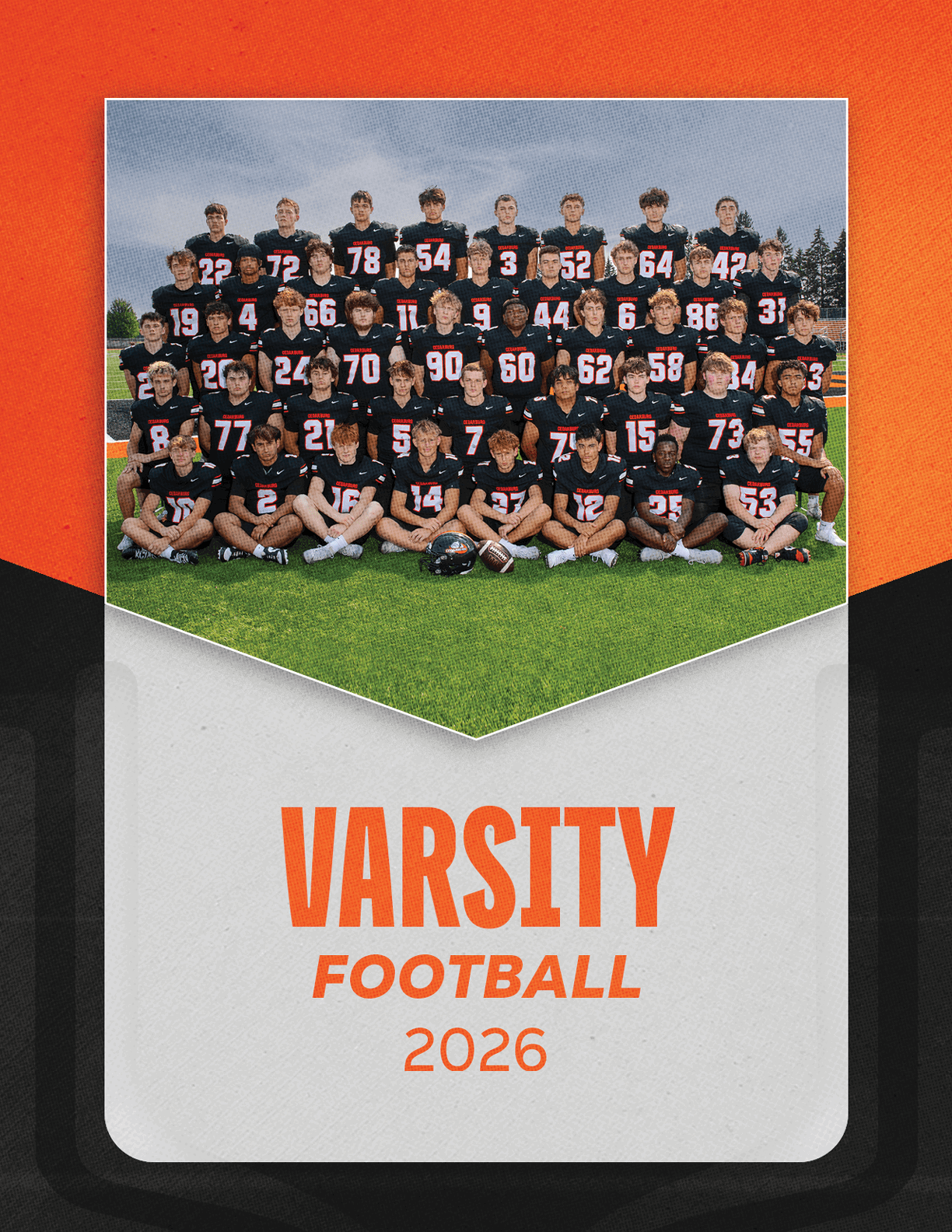 A group of football players sitting on a bench. Description generated by AI