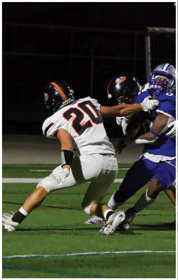 A group of football players celebrating a touchdown. Description generated by AI