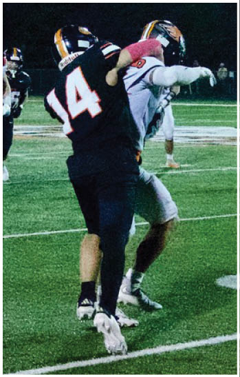 A group of football players celebrating a touchdown. Description generated by AI