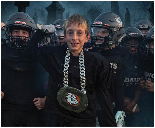 A group of football players on a field. Description generated by AI