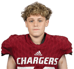 A person wearing a red football jersey with the word Chargers and the number 72 on it is standing against a white background. Description generated by AI