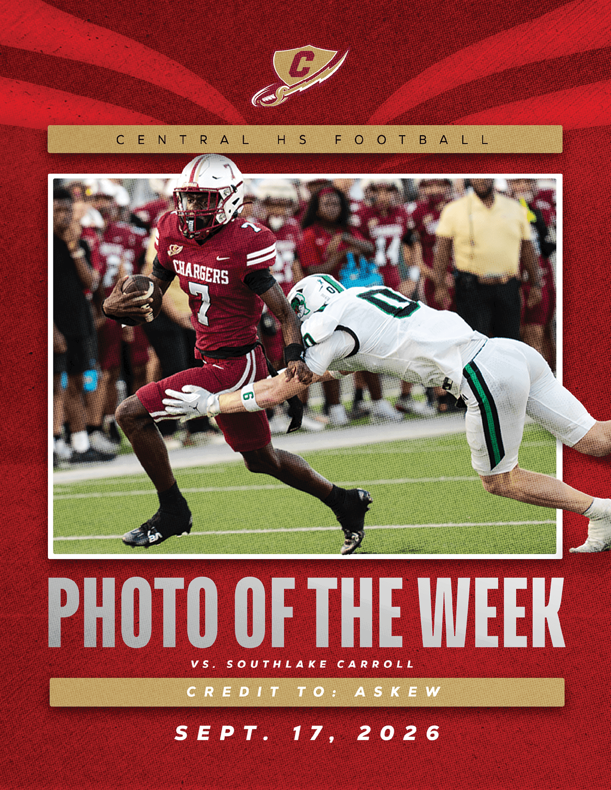 A person in a red football uniform running with the ball while another person in a white football uniform attempts to tackle them on a football field during a game. Description generated by AI