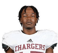 Person wearing a white football jersey with the word “CHARGERS" and the number 15 in maroon, along with an Adidas logo. Description generated by AI