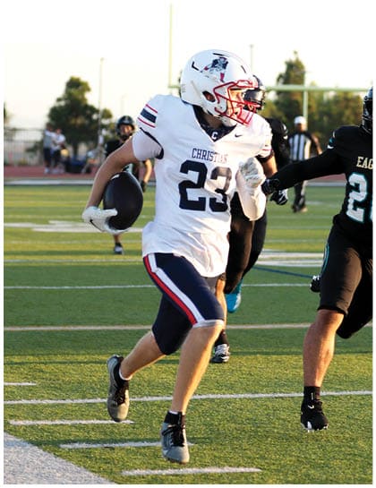 A football player wearing a blue jersey with the number 58 on it. Description generated by AI