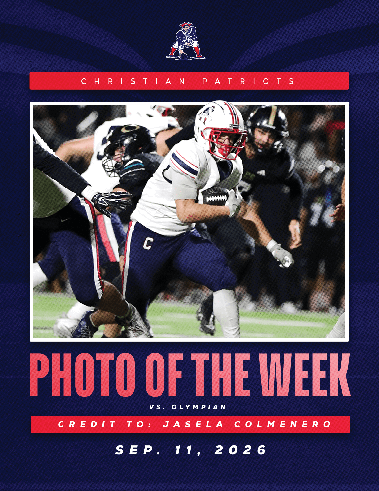 A person in a white football uniform with a red helmet is running with the ball while being pursued by people in black uniforms on a football field during a game. Description generated by AI