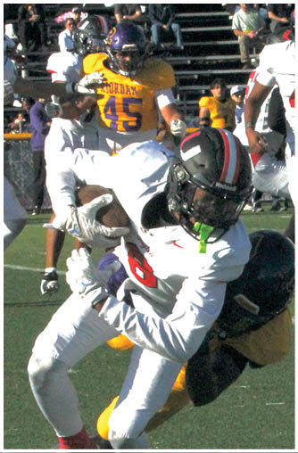 A football player running on the field. Description generated by AI