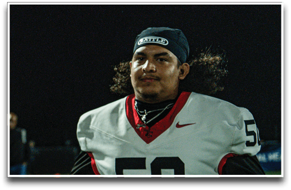 Three football players are standing on the field, one of them is smiling and wearing a black jersey with the number 55. AI generated content