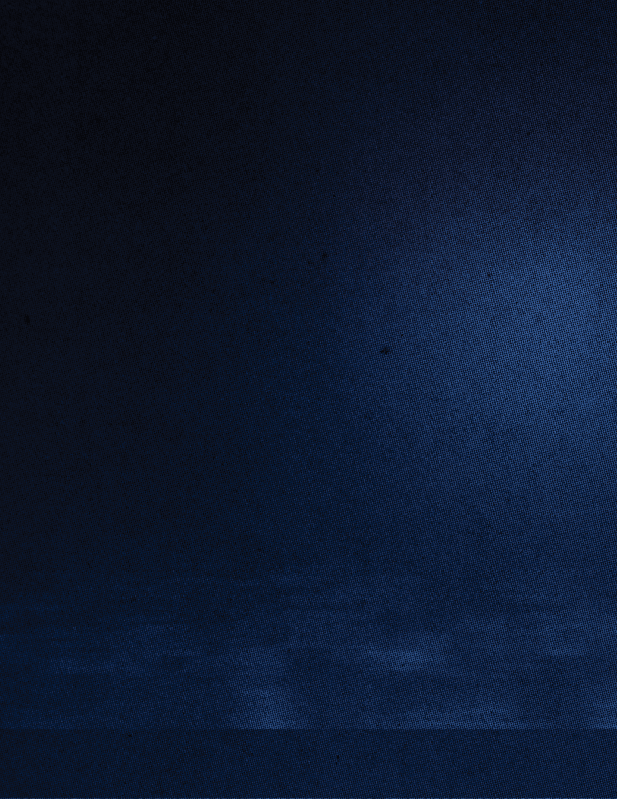 A dark blue textured background with subtle variations in shading and a faint light spot on the right side. Descripci n generada con IA