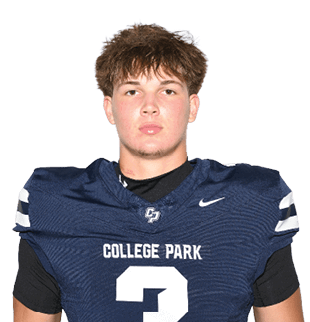 Person with short tousled hair wearing a dark blue football jersey with the number three and the words College Park on the front. Descripci n generada con IA