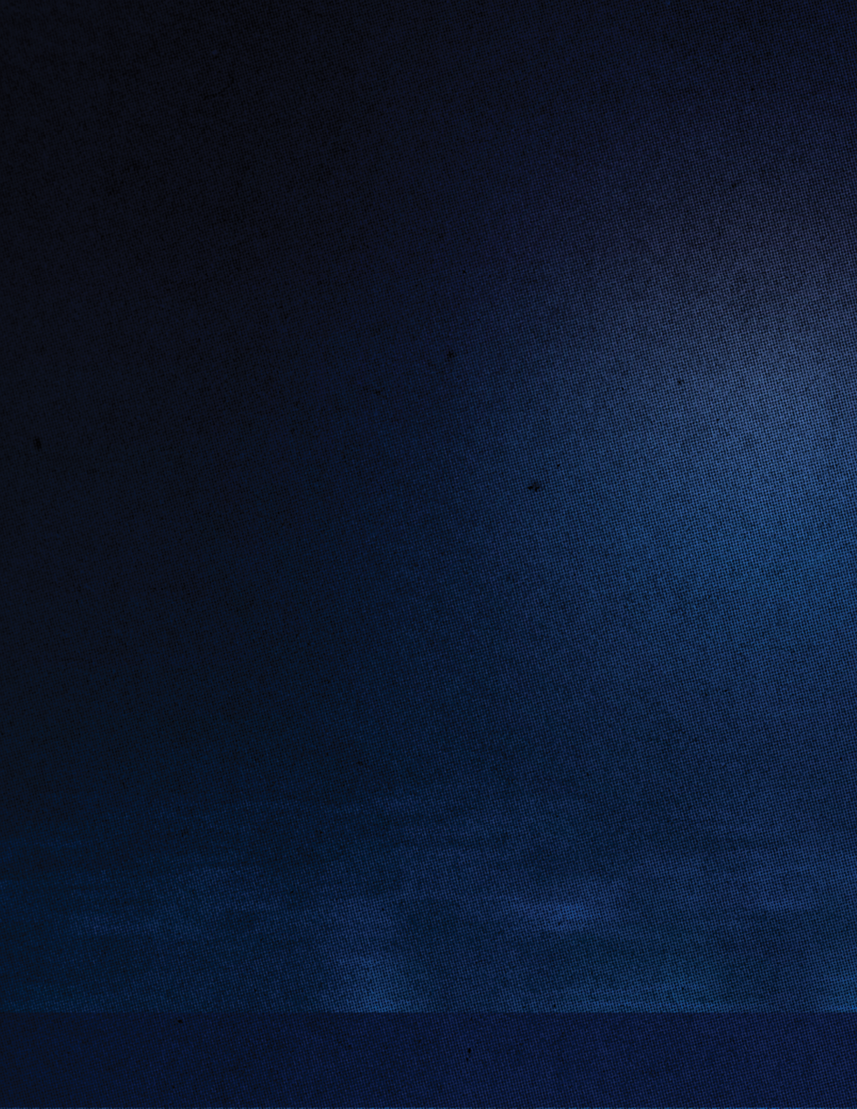 A dark blue textured background with subtle variations in shading and a faint light spot on the right side. Descripci n generada con IA