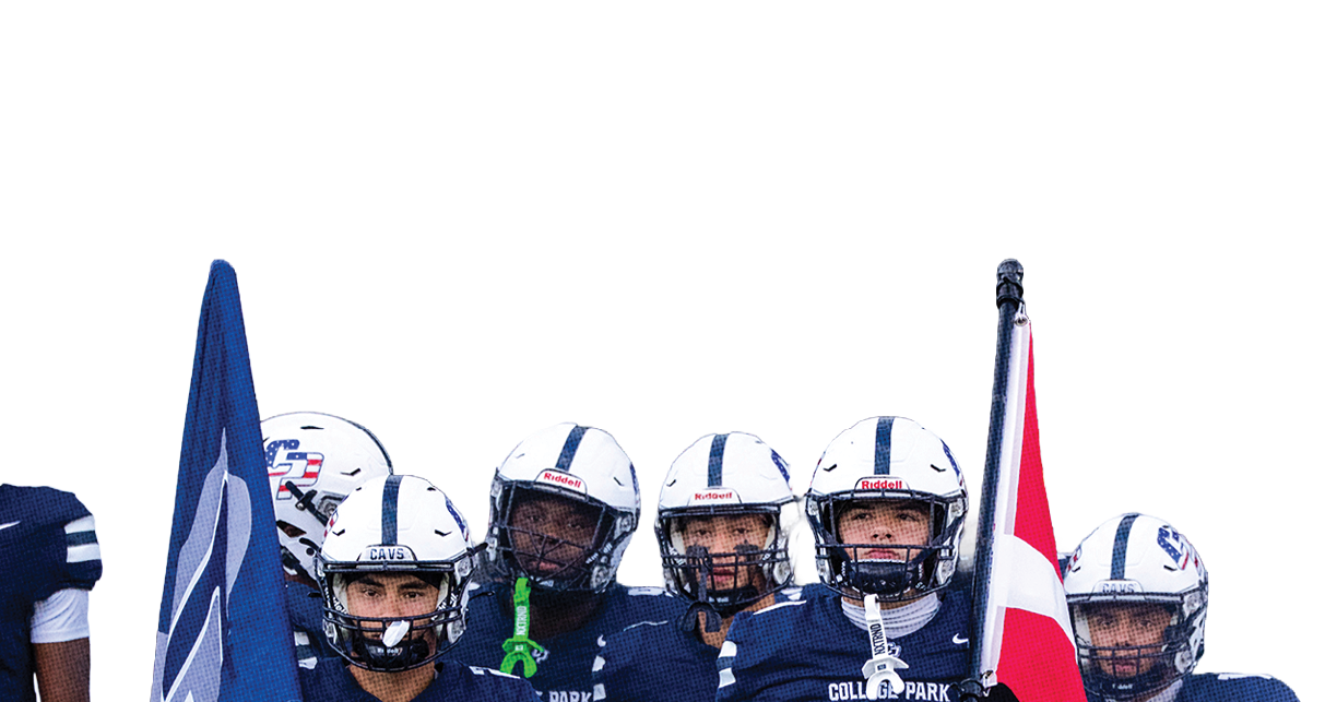 People in football uniforms stand together on a field, with two holding flags, one blue and one red. Descripci n generada con IA