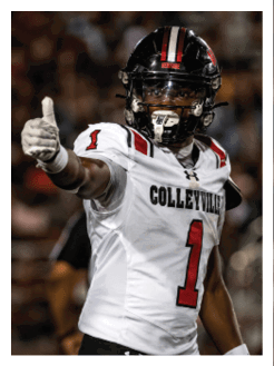 Two football players wearing black jerseys and holding hands. Description generated by AI