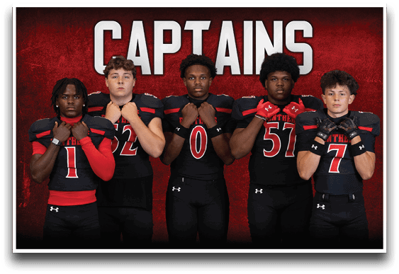Five adults wearing black and red football uniforms stand in a row with their fists raised near their chests against a red background with the word “CAPTAINS" above them. Description generated by AI
