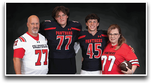 Four people wearing football jerseys with the numbers 77 and 45 pose together against a dark background, with one person holding a football. Description generated by AI
