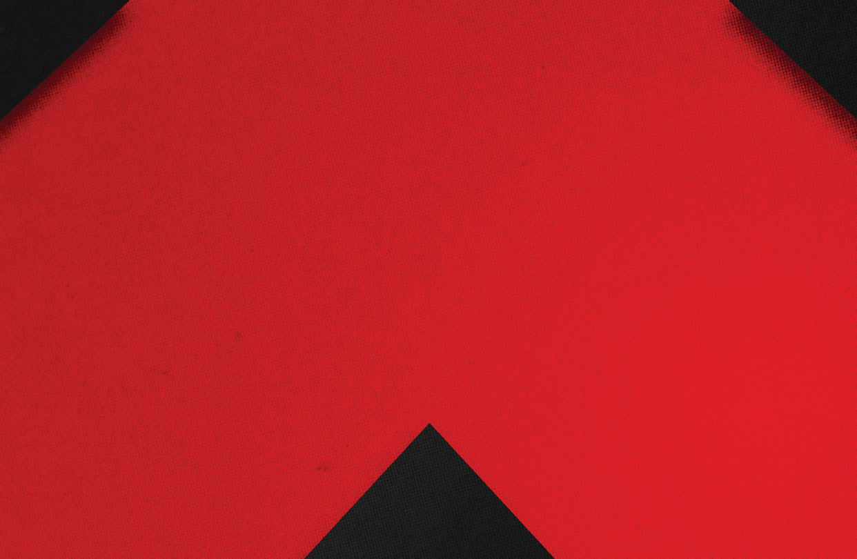 A red and black triangle. Description generated by AI