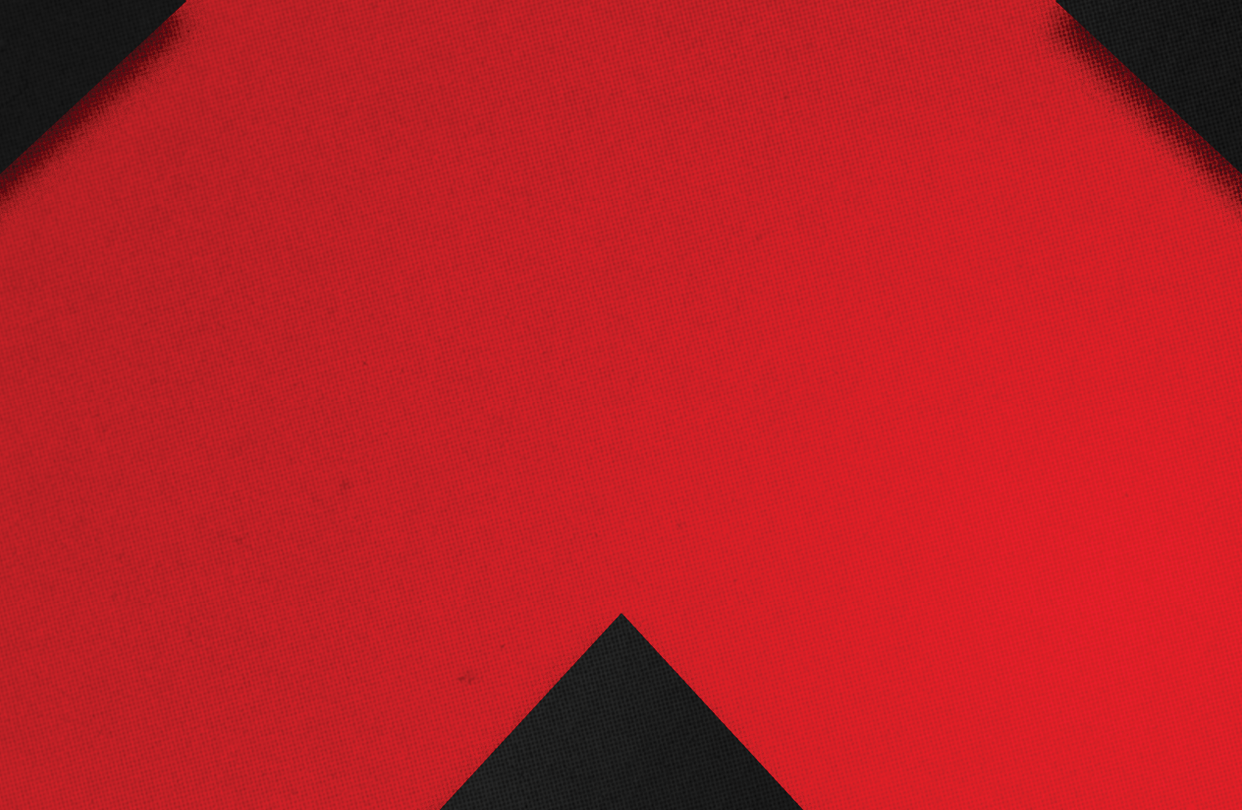 A red and black triangle. Description generated by AI