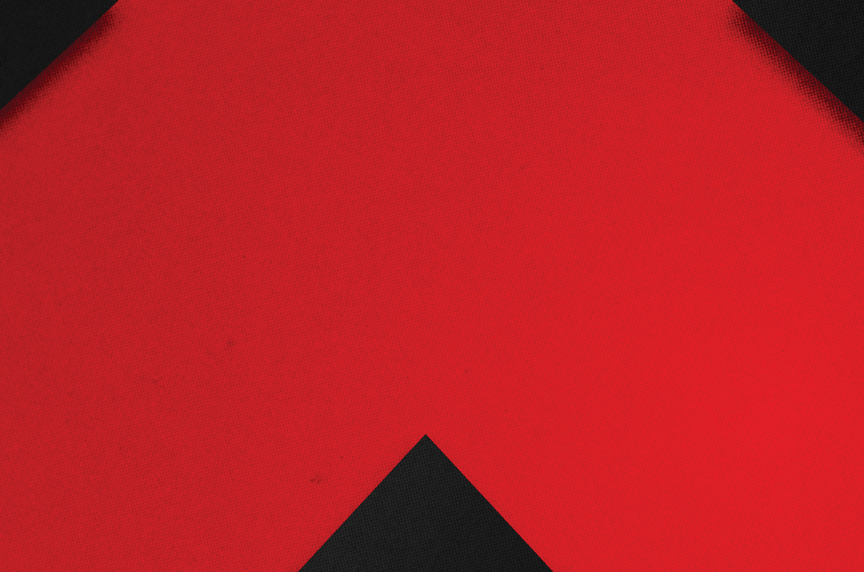 A red and black triangle. Description generated by AI