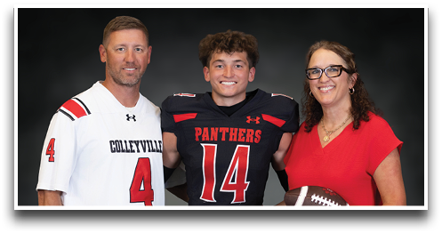 Three people stand together smiling with one wearing a black football uniform numbered 14, another in a white jersey numbered 4, and the third in a red dress holding a football. Description generated by AI