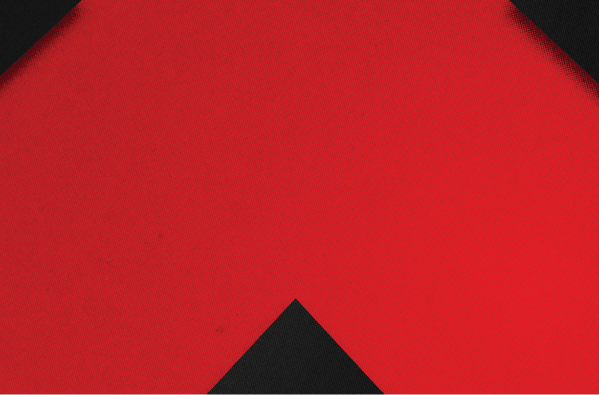 A red and black triangle. Description generated by AI