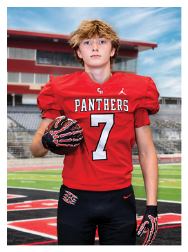 A football player wearing a blue and red jersey. Description generated by AI