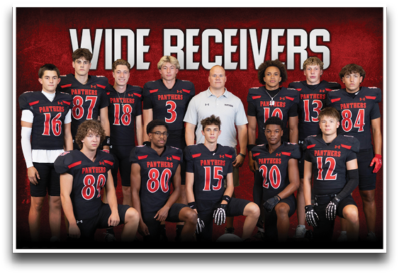 A group of people wearing black and red football uniforms with the word Panthers pose together in front of a red and black background with the words Wide Receivers above them. Description generated by AI