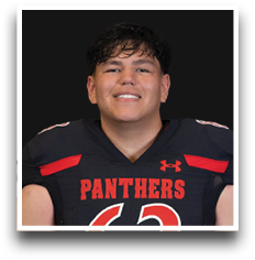 A person with short dark hair is smiling and wearing a black football jersey with red accents and the word Panthers across the chest. Description generated by AI