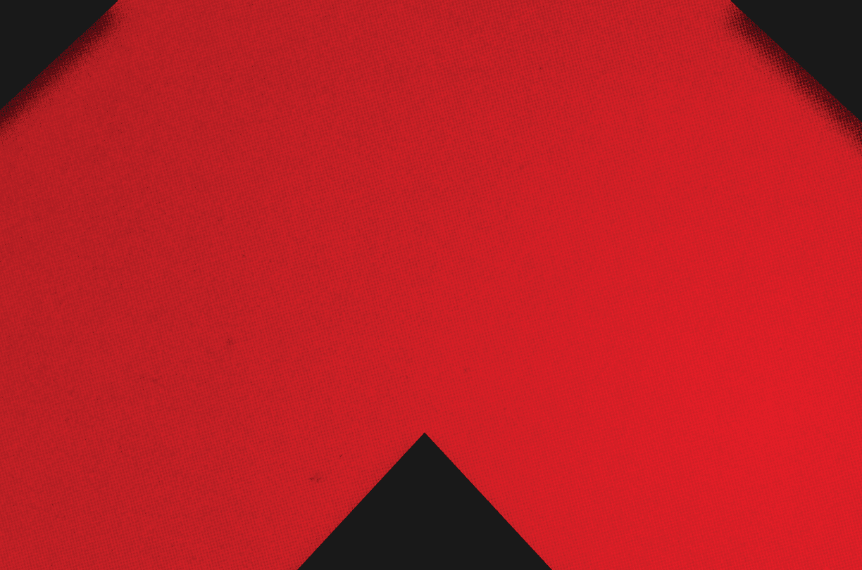 A red and black triangle. Description generated by AI