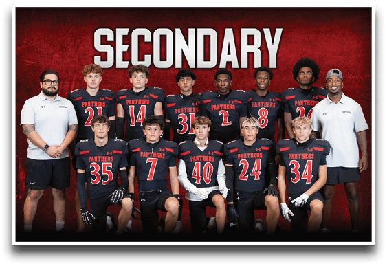A group of people wearing black sports uniforms with red and white accents pose together in two rows in front of a red background with the word “SECONDARY" displayed above them. Description generated by AI