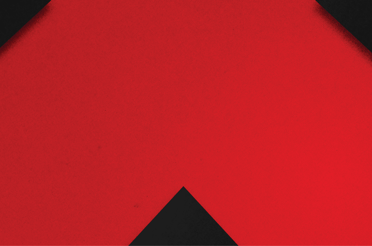 A red and black triangle. Description generated by AI