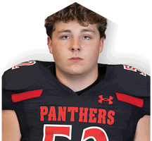 A person with short curly hair wearing a black football jersey with red accents and the word Panthers across the chest. Description generated by AI