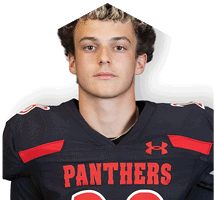 A young man wearing a white jersey with the number 10 on it. Description generated by AI