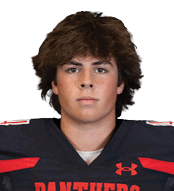 Person with medium-length hair wearing a black football jersey with red accents and the word “PANTHERS" on the front. Description generated by AI