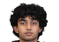 A person with curly hair wearing a black football jersey with the number 18 and the word Panthers stands facing forward. Description generated by AI