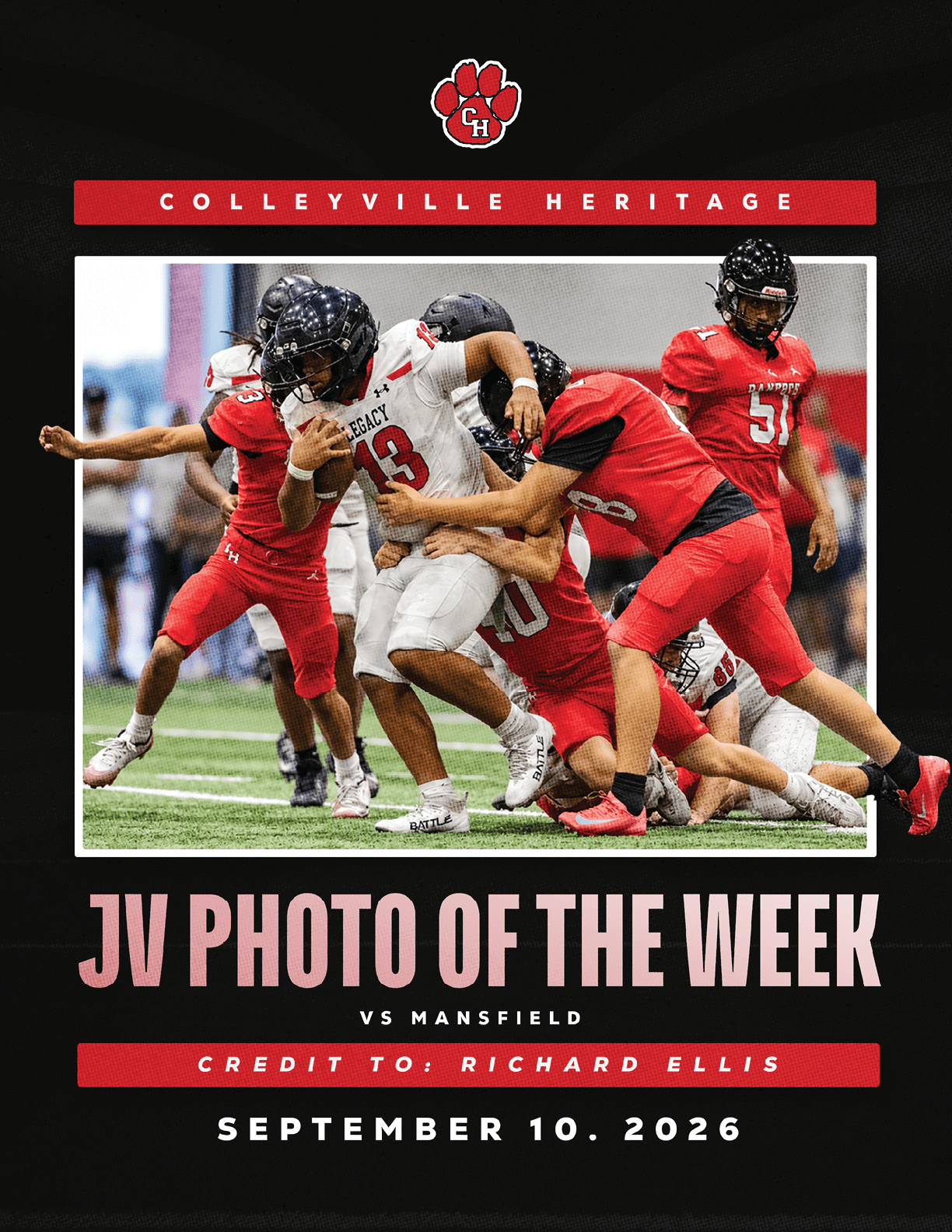 Several athletes in football uniforms are engaged in a tackle during a game, with one player in white holding the ball and multiple players in red attempting to stop them on a field. Description generated by AI