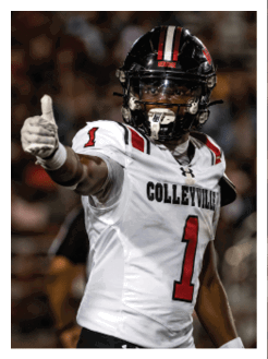Two football players wearing black jerseys and holding hands. Description generated by AI