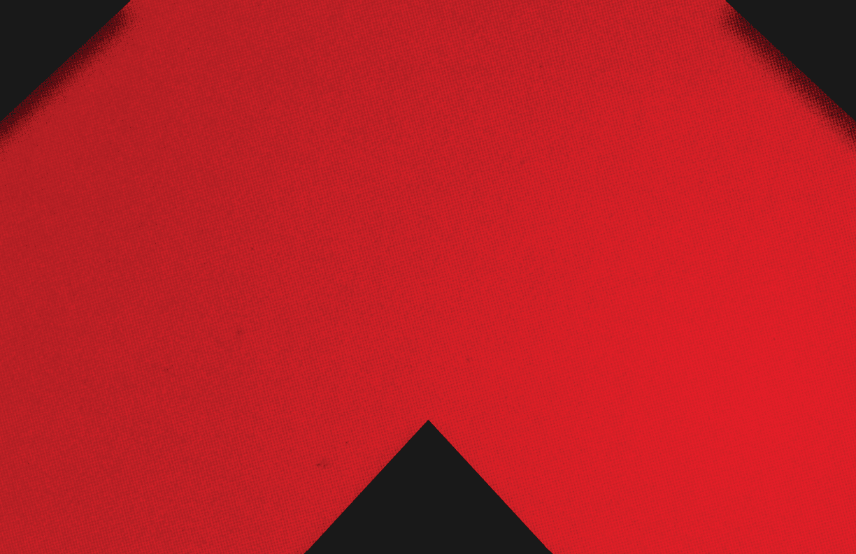 A red and black triangle. Description generated by AI