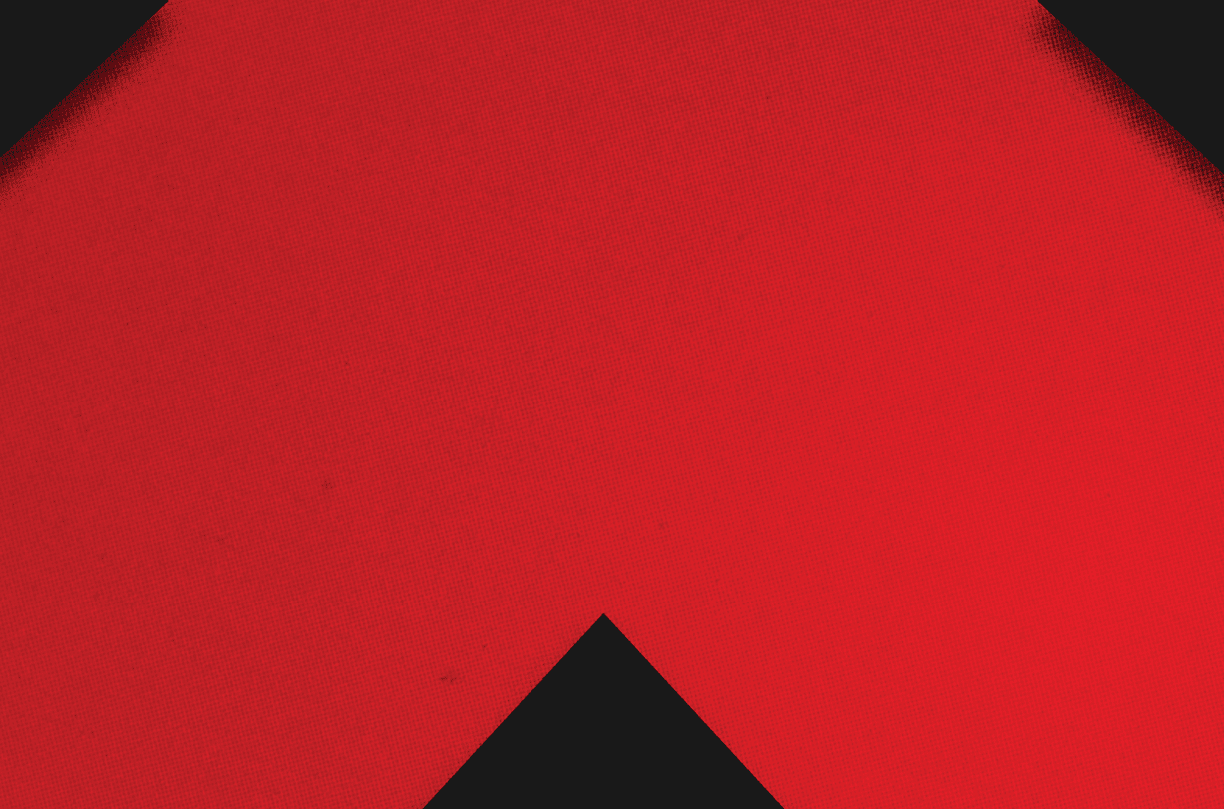 A red and black triangle. Description generated by AI