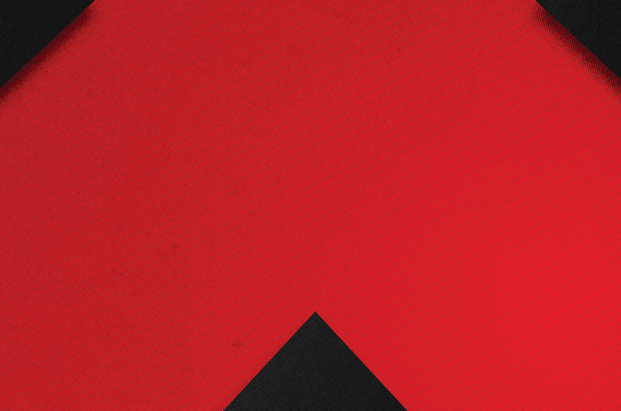 A red and black triangle. Description generated by AI