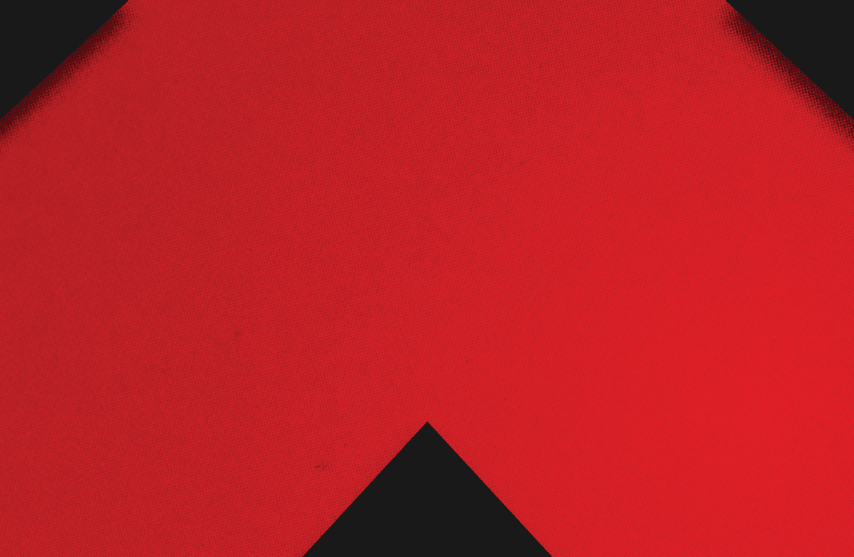 A red and black triangle. Description generated by AI
