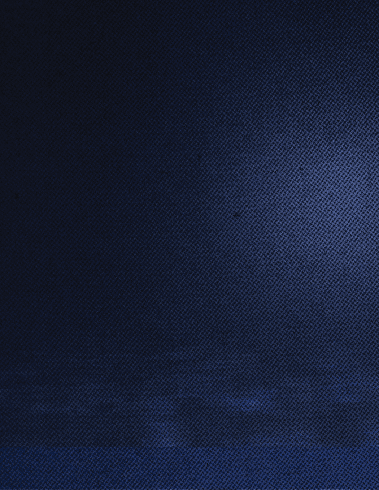 A yellowish-brown sky with a few clouds. Description generated by AI