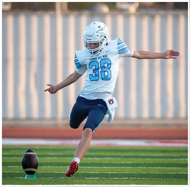 A football player wearing a blue jersey with the number 58 on it. Description generated by AI