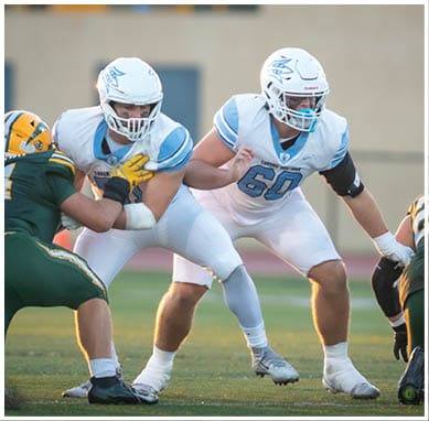 A football player wearing a blue jersey with the number 58 on it. Description generated by AI
