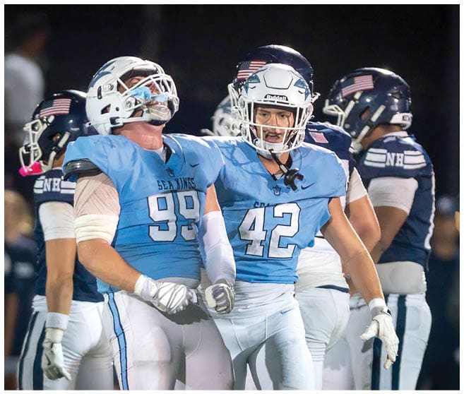 A football player wearing a blue jersey with the number 58 on it. Description generated by AI