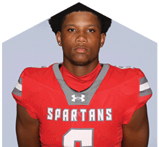 A young man wearing a white jersey with the number 10 on it. Description generated by AI