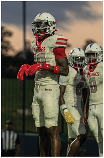 A group of football players celebrating a touchdown. Description generated by AI