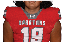 A young man wearing a white jersey with the number 10 on it. Description generated by AI