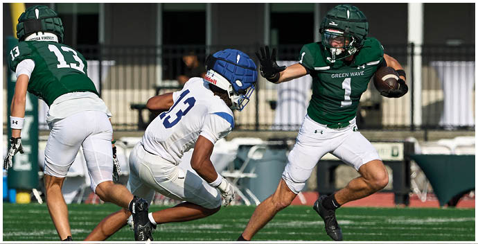 A football player wearing a blue and white uniform. Description generated by AI