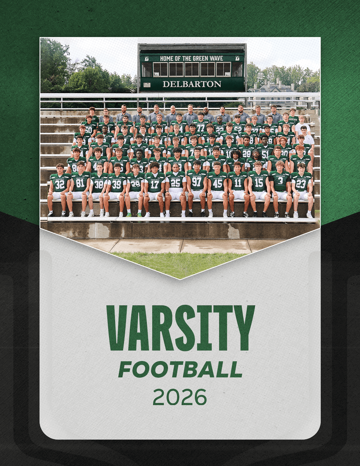 A group of football players sitting on a bench. Description generated by AI